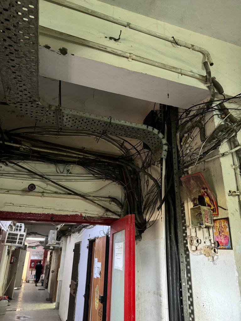 Loose cable loops and open junction box 