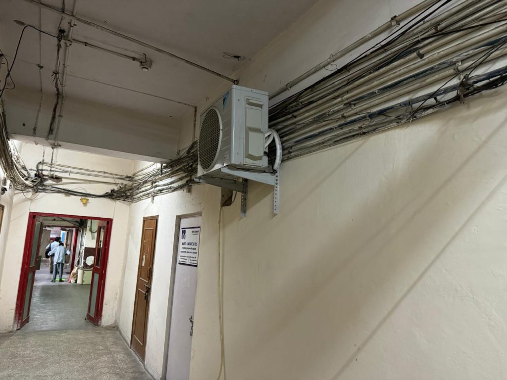 AC condenser narrowing corridor